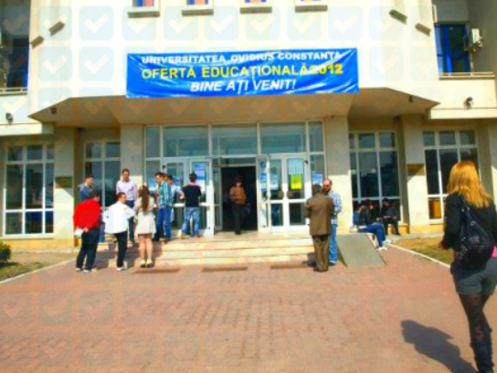 Medical students, roaming around in front of the building.