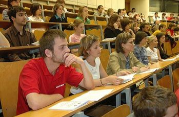 A group of medical students listening attentively